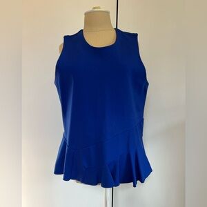 J Crew top with slight peplum detail. Size L.